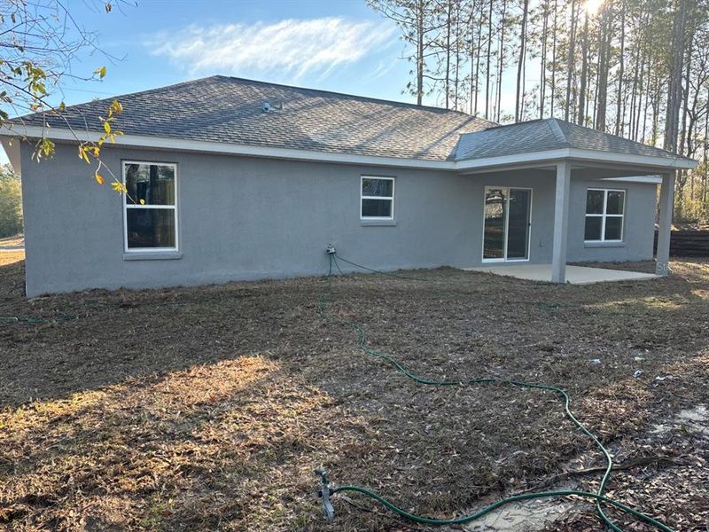 Exterior details and patio area of a home in , Citrus Springs (Image 18).