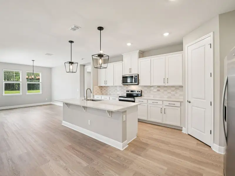Furnished interior view inside a new home in Ridgehaven - Signature Series, Ormond Beach (Image 4).