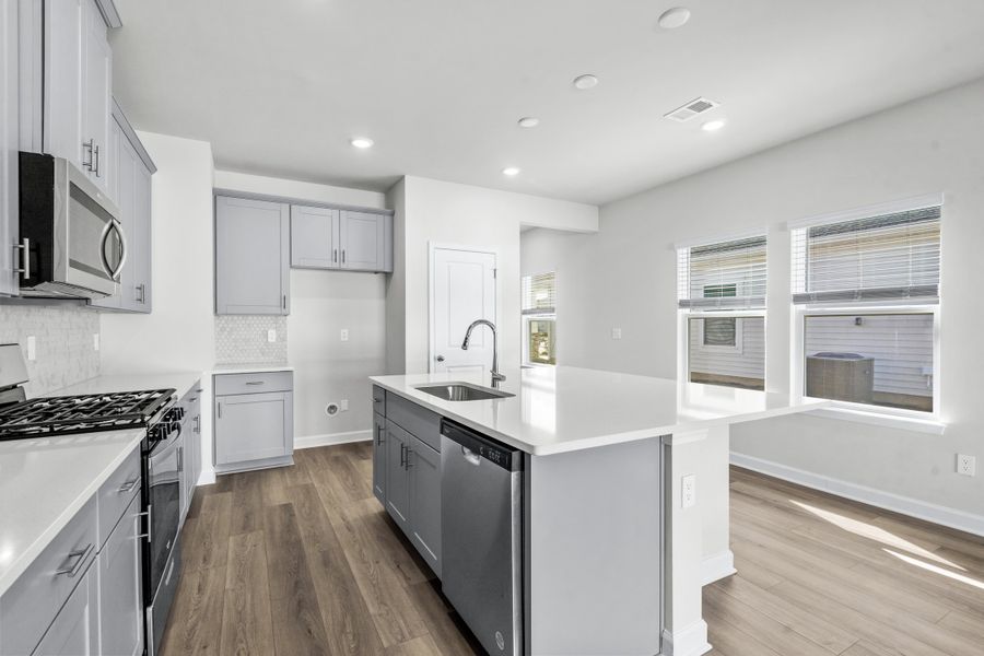 Furnished interior view inside a new home in Cypress Ridge - The Boardwalk Series, Longs (Image 5).