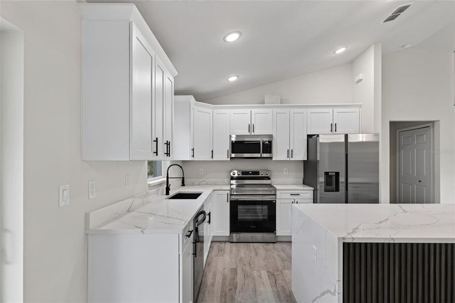 Furnished interior view inside a new home in , Dunnellon (Image 13).