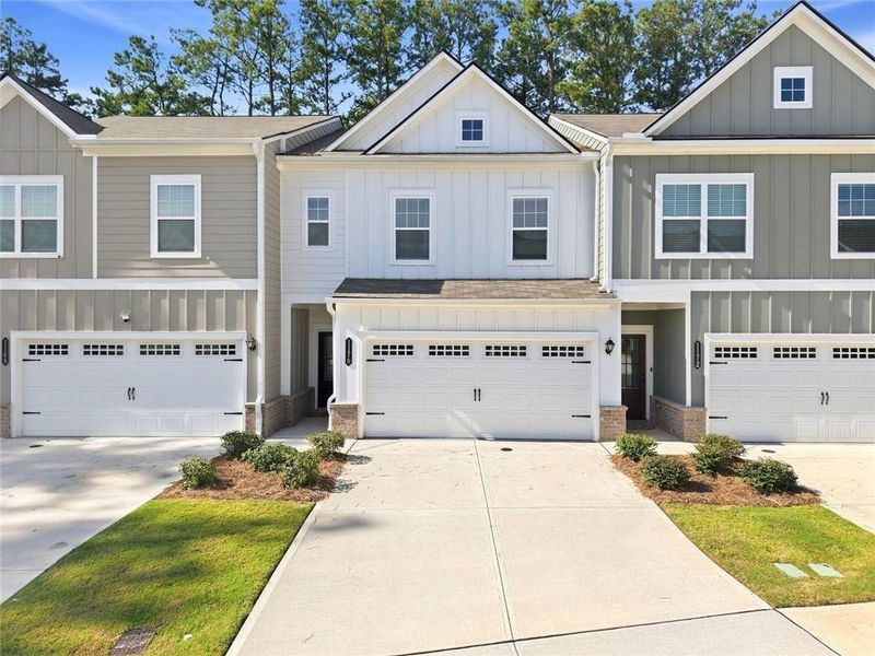 Front exterior of a new home in , Sugar Hill, GA, highlighting curb appeal (Image 26). Front exterior of a new home in , Sugar Hill, GA, highlighting curb appeal (Image 26).