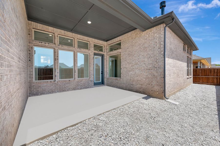 Exterior details and patio area of a home in Elements at Viridian - Garden Series, Arlington (Image 3). Exterior details and patio area of a home in Elements at Viridian - Garden Series, Arlington (Image 3).
