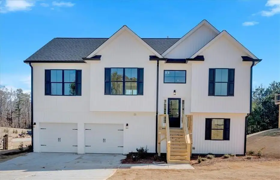 Front exterior of a new home in , Rome, GA, highlighting curb appeal (Image 1). Front exterior of a new home in , Rome, GA, highlighting curb appeal (Image 1).