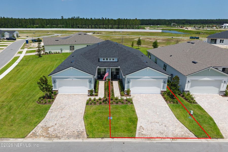 Front exterior of a new home in , St. Augustine, FL, highlighting curb appeal (Image 22).