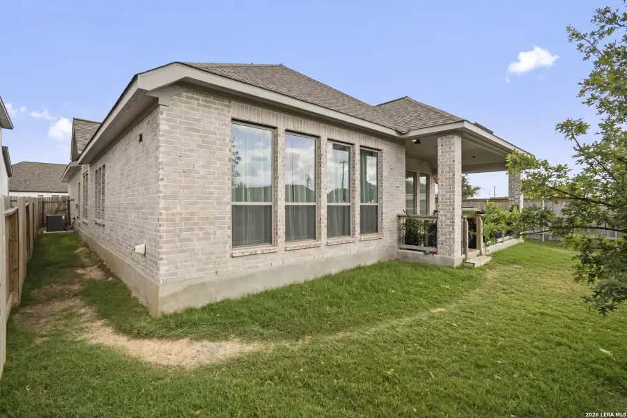Exterior details and patio area of a home in Meadows of Mill Creek, Seguin (Image 22).