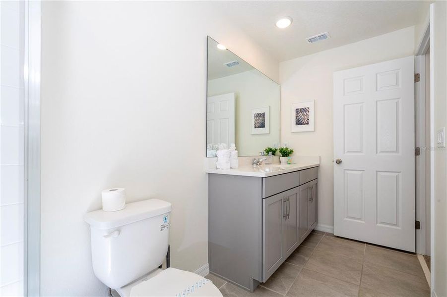 Furnished interior view inside a new home in Solara Resort, Kissimmee (Image 72).