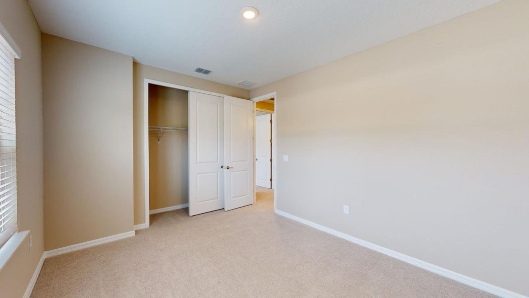 Representative unfurnished interior of a home built from the Barbuda by Taylor Morrison in Headwaters at Lofton Creek, Yulee (Image 45).