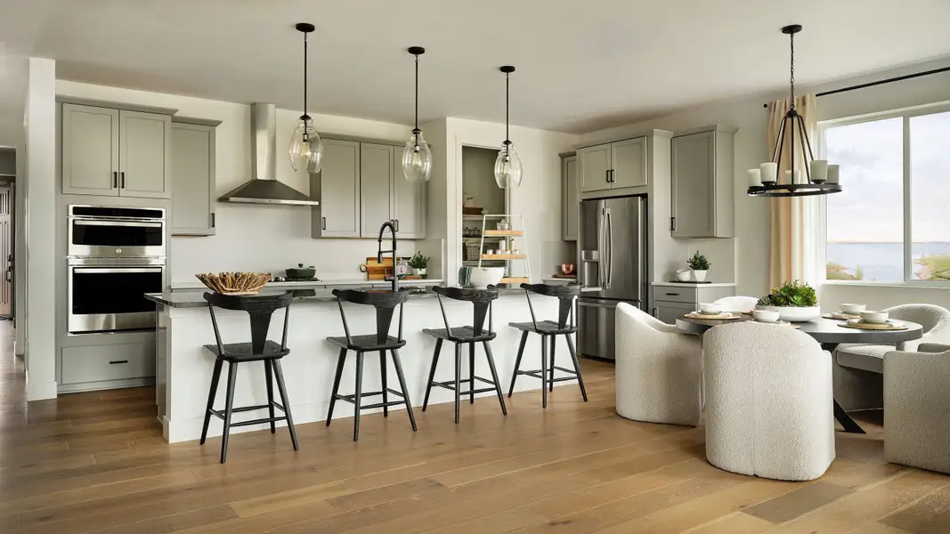 Representative furnished interior of a home built from the Boulder by Taylor Morrison in Parterre City Collection, Thornton (Image 2).