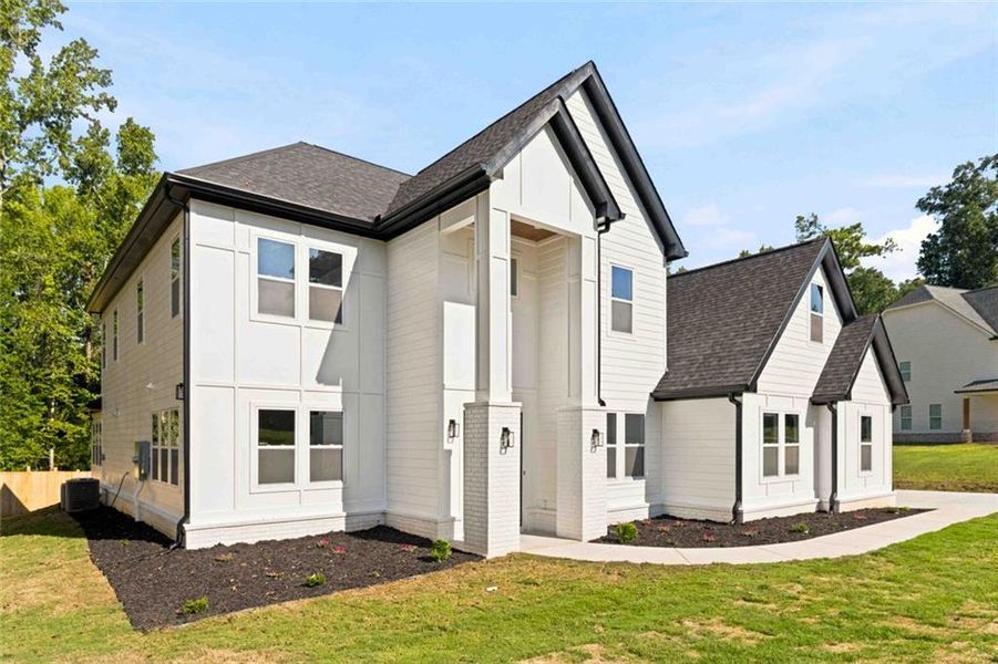 Front exterior of a new home in , Griffin, GA, highlighting curb appeal (Image 29).