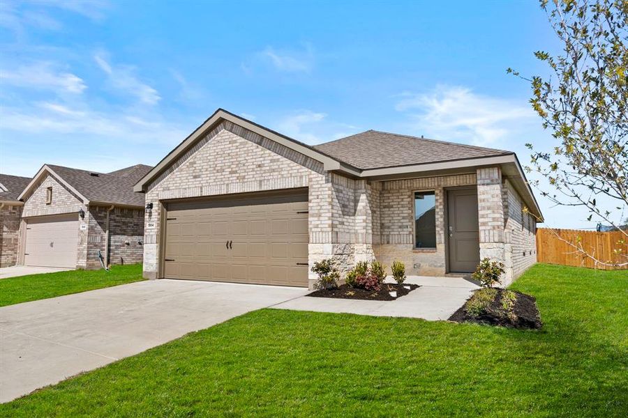 Front exterior of a new home in Meadowbrook Estates, Cleburne, TX, highlighting curb appeal (Image 2).