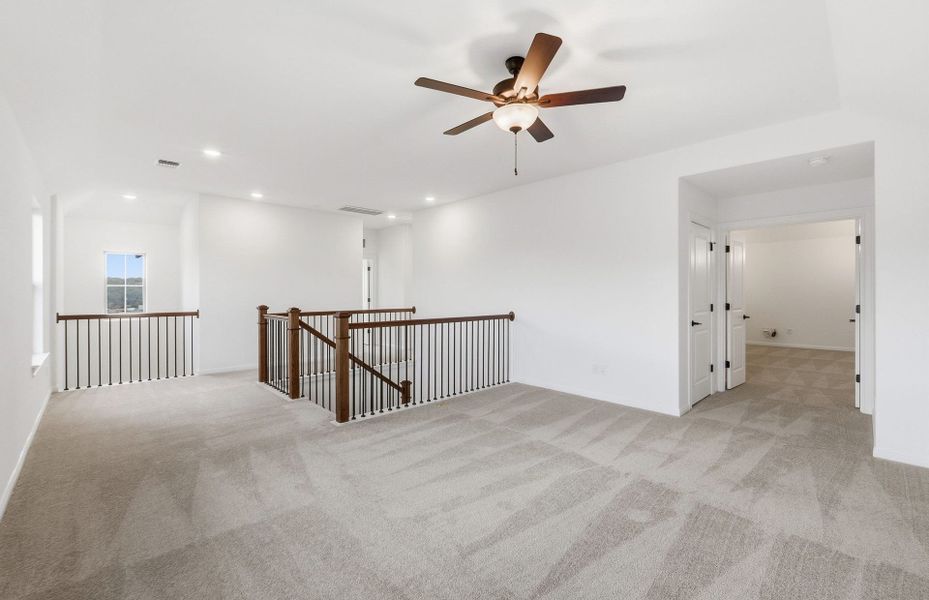 Spacious, unfurnished interior of a new home in Saddleback at Santa Rita Ranch, Liberty Hill (Image 49).