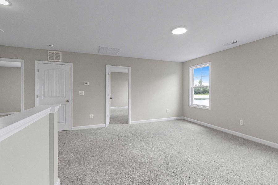 Representative unfurnished interior of a home built from the Magnolia by Caviness & Cates Communities in Bartlett Manor, Youngsville (Image 197).