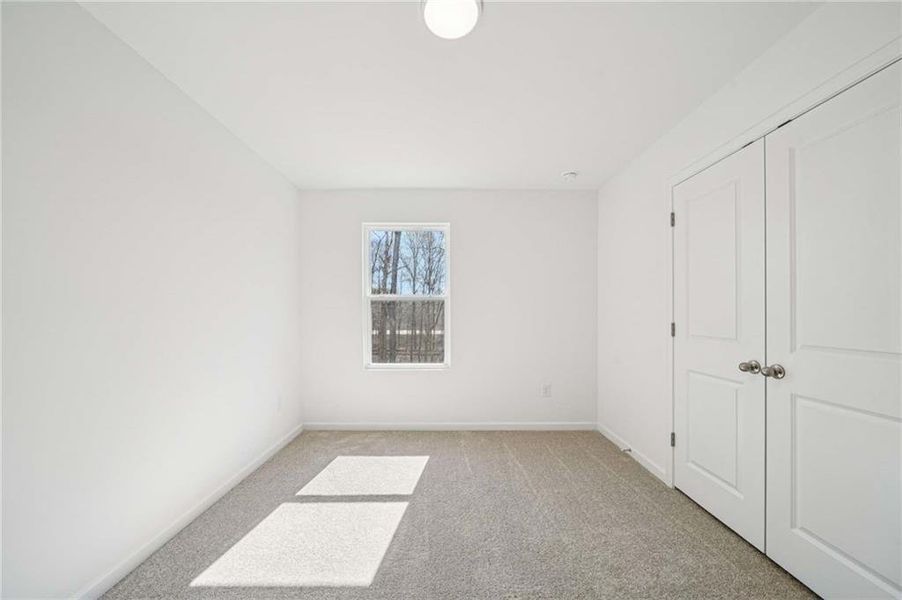 Spacious, unfurnished interior of a new home in Eastlyn Crossing, Flowery Branch (Image 11). Spacious, unfurnished interior of a new home in Eastlyn Crossing, Flowery Branch (Image 11).