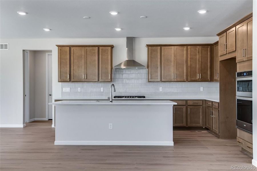 Furnished interior view inside a new home in Ensemble at The Aurora Highlands, Aurora (Image 14).