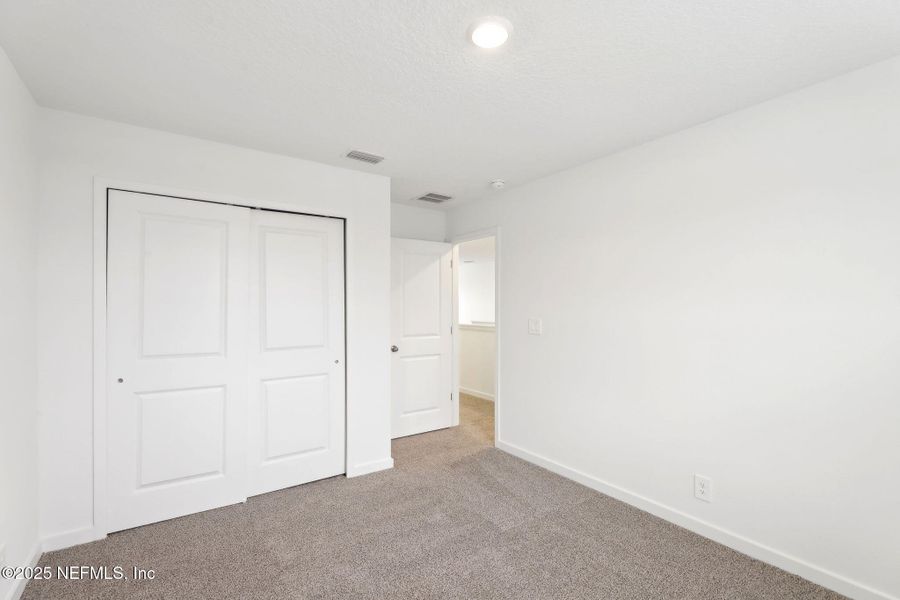 Spacious, unfurnished interior of a new home in Lakes at Bella Lago - Signature Series, Green Cove Springs (Image 15). Spacious, unfurnished interior of a new home in Lakes at Bella Lago - Signature Series, Green Cove Springs (Image 15).