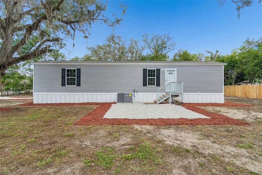 Exterior details and patio area of a home in , New Port Richey (Image 24).