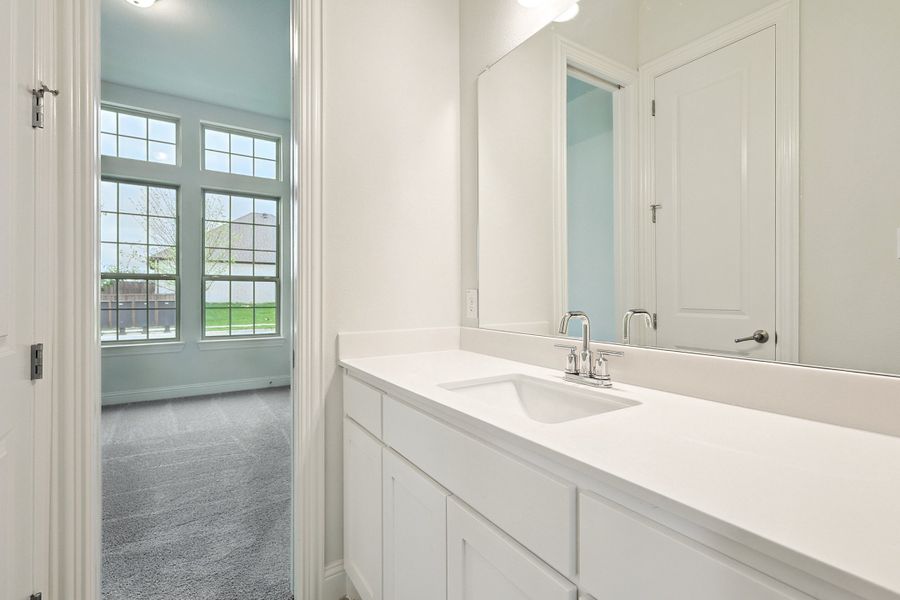 Representative furnished interior of a home built from the Classic Series - Vanderbilt by DRB Homes in Oaks at San Gabriel, Georgetown (Image 36).