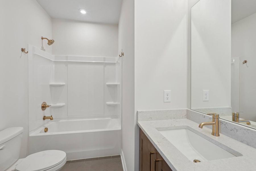 Representative furnished interior of a home built from the Kinston by Tri Pointe Homes in Elm Park, Raleigh (Image 9).