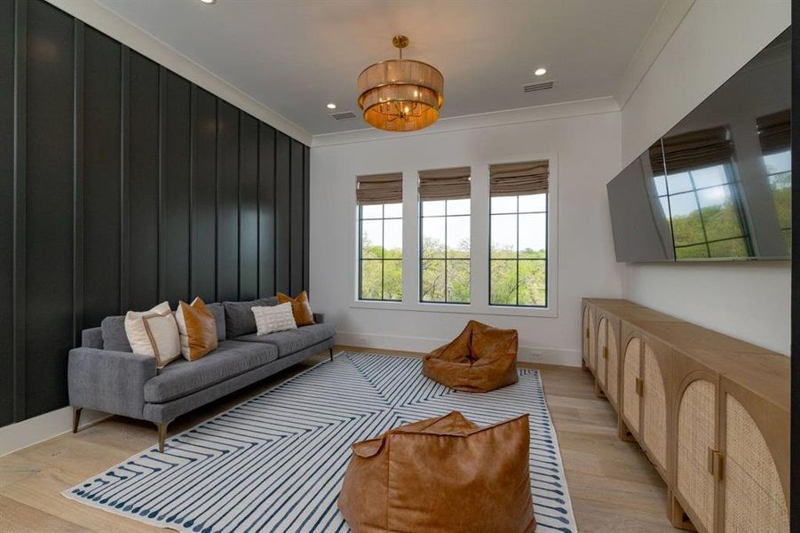 Upstairs loft is a great space to gather and has a door that can be closed off to the main living space downstairs.