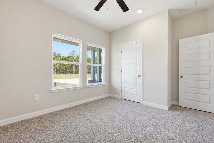 Spacious, unfurnished interior of a new home in McCarthy Estates, Defuniak Springs (Image 23).