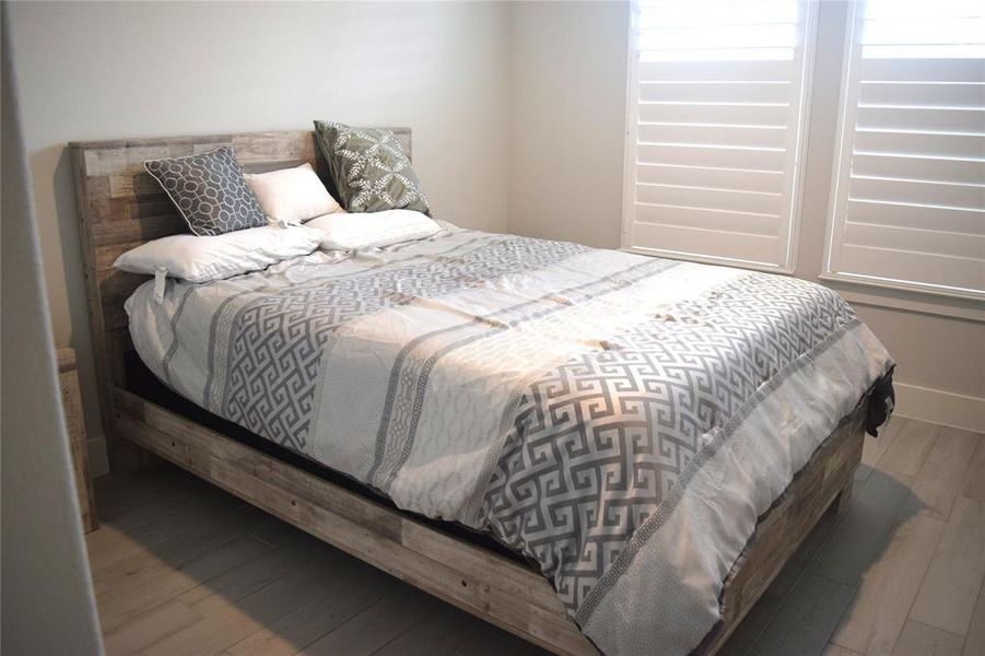 Furnished interior view inside a new home in , Hickory Creek (Image 32).