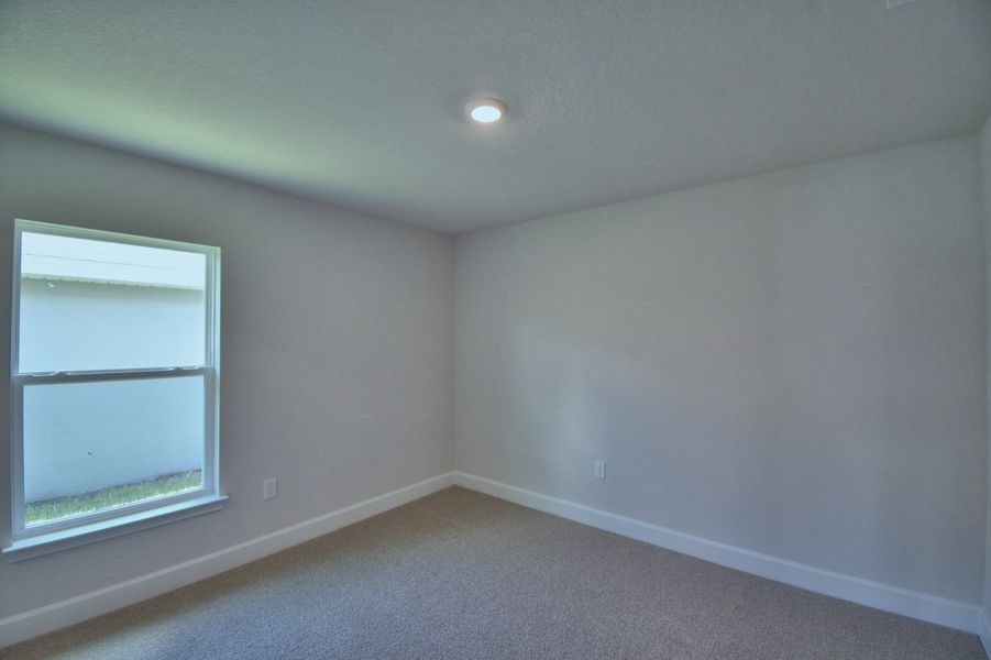 Spacious, unfurnished interior of a new home in Villamar, Winter Haven (Image 23).