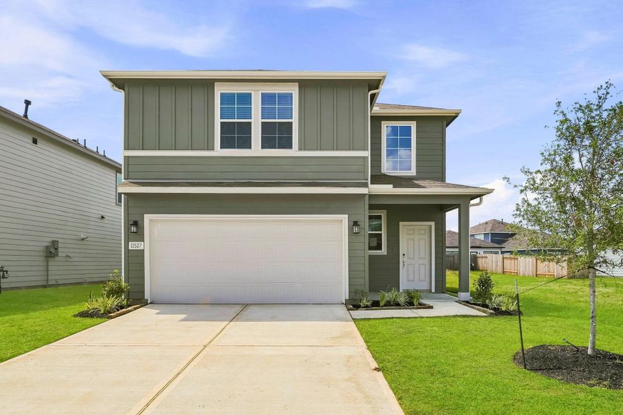 Front exterior of a new home in Barrett Crossing, Crosby, TX, highlighting curb appeal (Image 1). Front exterior of a new home in Barrett Crossing, Crosby, TX, highlighting curb appeal (Image 1).