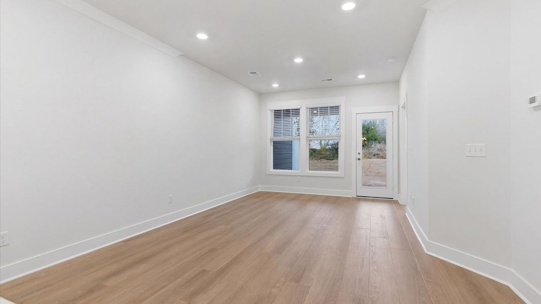 First-rate living space with tasteful hardwood floors and a functional open-concept design at Pelham Crossing