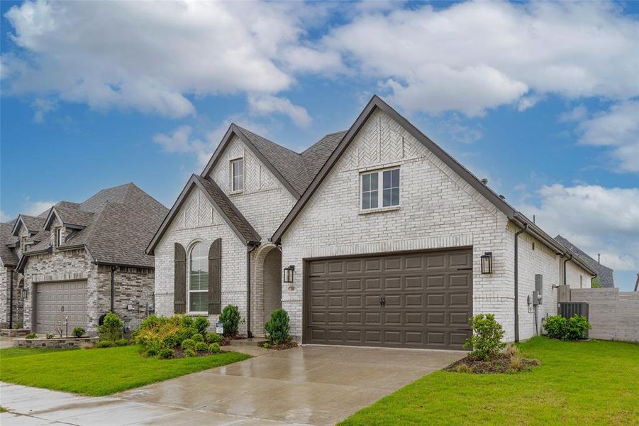 Front exterior of a new home in , McKinney, TX, highlighting curb appeal (Image 27).