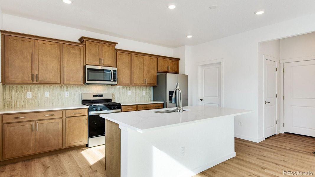 Furnished interior view inside a new home in Trails at Crowfoot, Parker (Image 5).