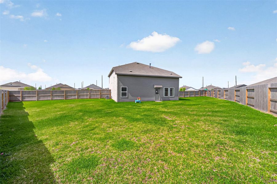 Exterior details and patio area of a home in Anniston, Katy (Image 23).