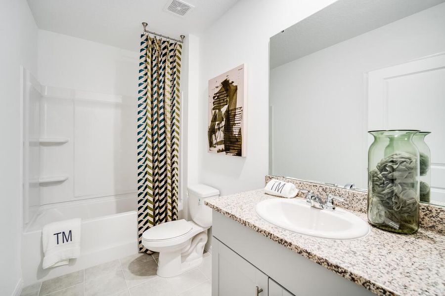 Furnished interior view inside a new home in Waterstone, Groveland (Image 22).