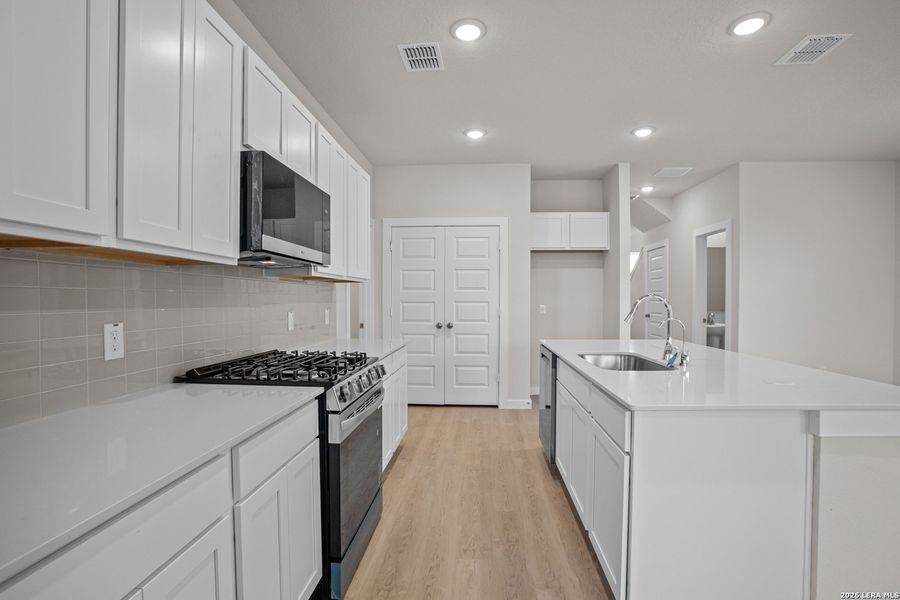Furnished interior view inside a new home in Mesa Vista, San Antonio (Image 16).