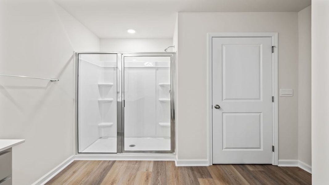 Spacious, unfurnished interior of a new home in Paddock Point, Roebuck (Image 27). Spacious, unfurnished interior of a new home in Paddock Point, Roebuck (Image 27).