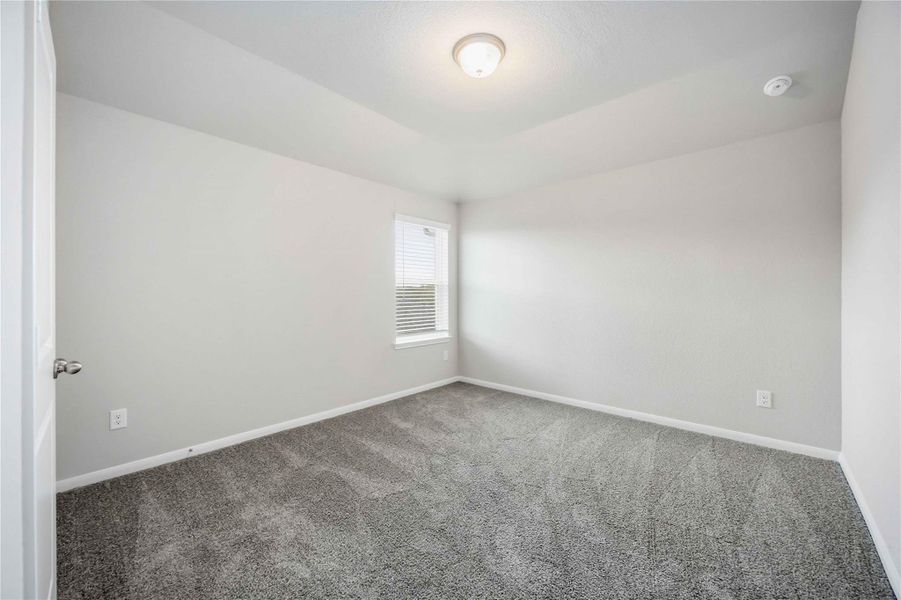 Spacious, unfurnished interior of a new home in Sunterra, Katy (Image 29).