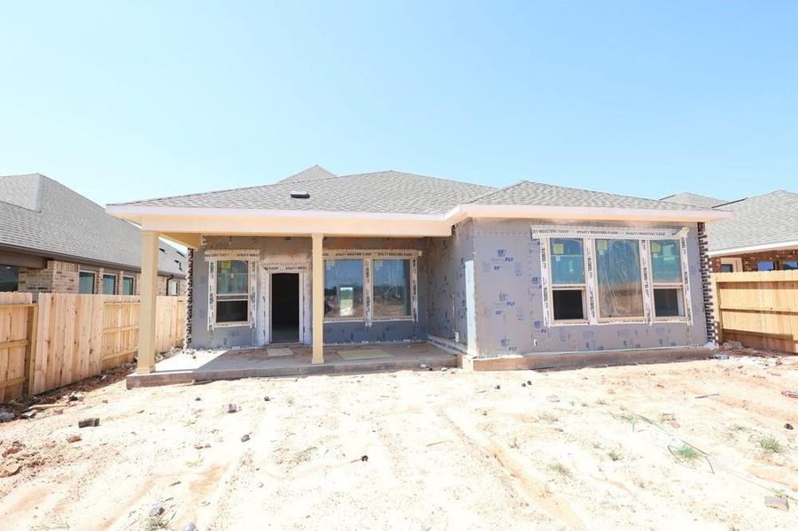 Front exterior of a new home in Escondido 50' Homesites, Magnolia, TX, highlighting curb appeal (Image 1). Front exterior of a new home in Escondido 50' Homesites, Magnolia, TX, highlighting curb appeal (Image 1).