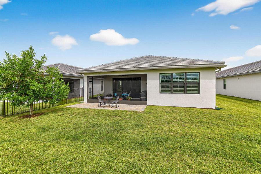 Front exterior of a new home in , Port St. Lucie, FL, highlighting curb appeal (Image 1).