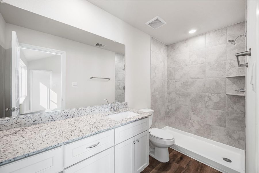 Furnished interior view inside a new home in Hill & Dale Ranch, Splendora (Image 7).