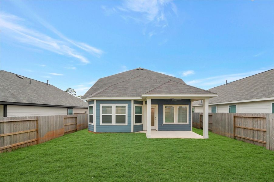 Exterior details and patio area of a home in Lone Star Landing, Montgomery (Image 3).