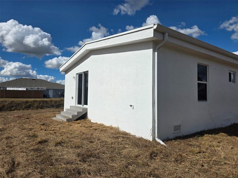 Exterior details and patio area of a home in , Lehigh Acres (Image 3).