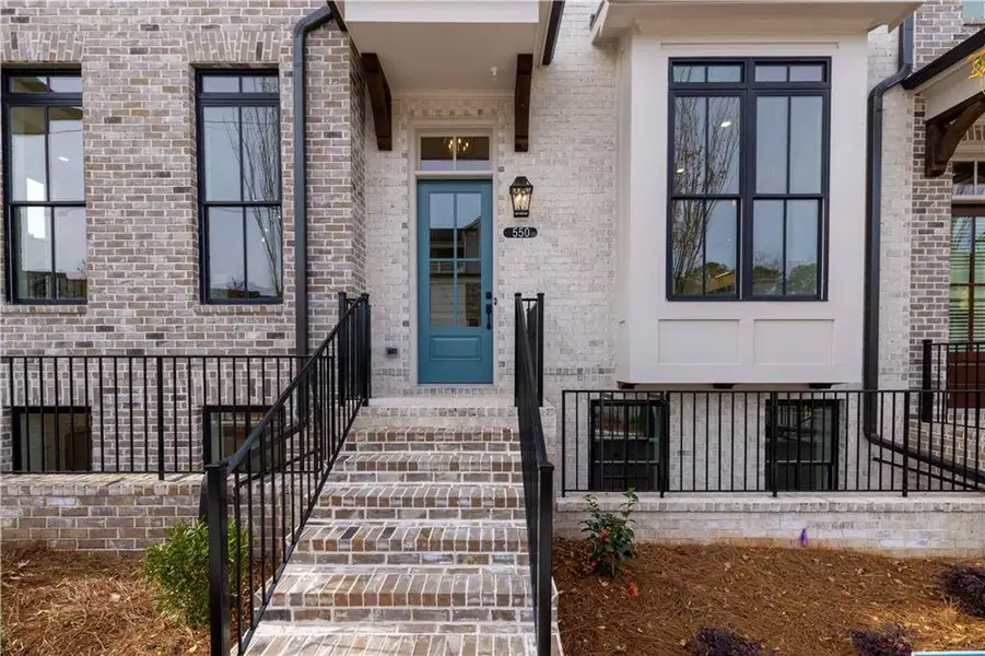 Exterior details and patio area of a home in Townes 333, Peachtree Corners (Image 25).