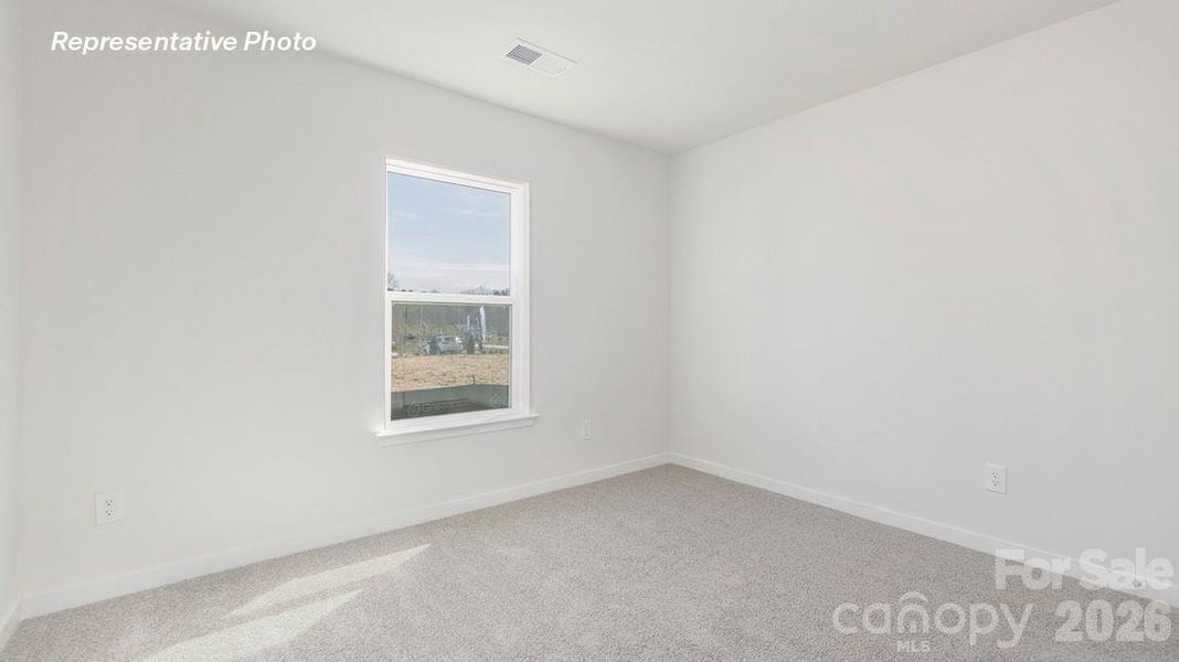 Spacious, unfurnished interior of a new home in Reedy Creek Preserve, Charlotte (Image 17).