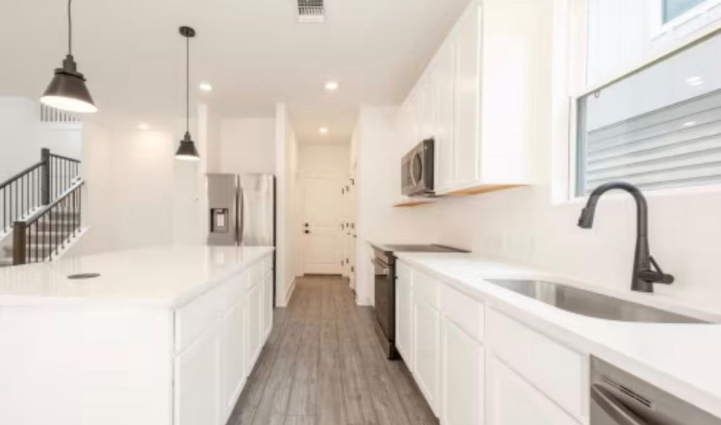 Furnished interior view inside a new home in Ryegrass Collection – Freedom at Anthem, Kyle (Image 3).