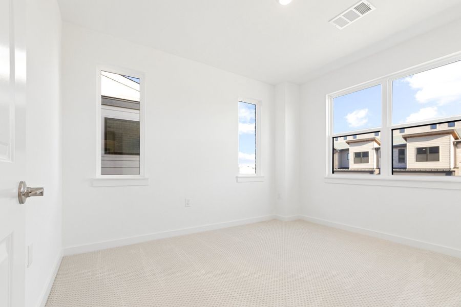Spacious, unfurnished interior of a new home in Willow Grove Townhomes, Melissa (Image 22).
