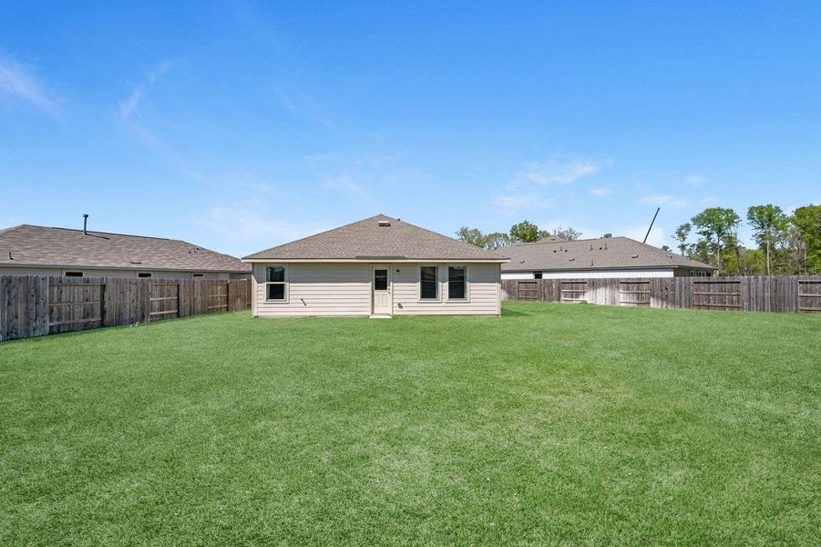 Exterior details and patio area of a home in , New Caney (Image 2). Exterior details and patio area of a home in , New Caney (Image 2).