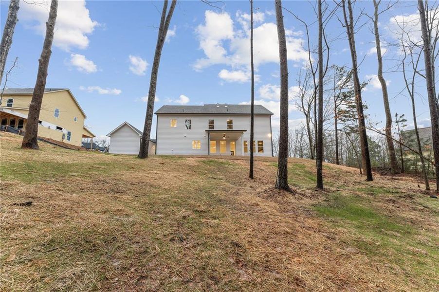 Exterior details and patio area of a home in The Reserve at Knollwood, Canton (Image 23).