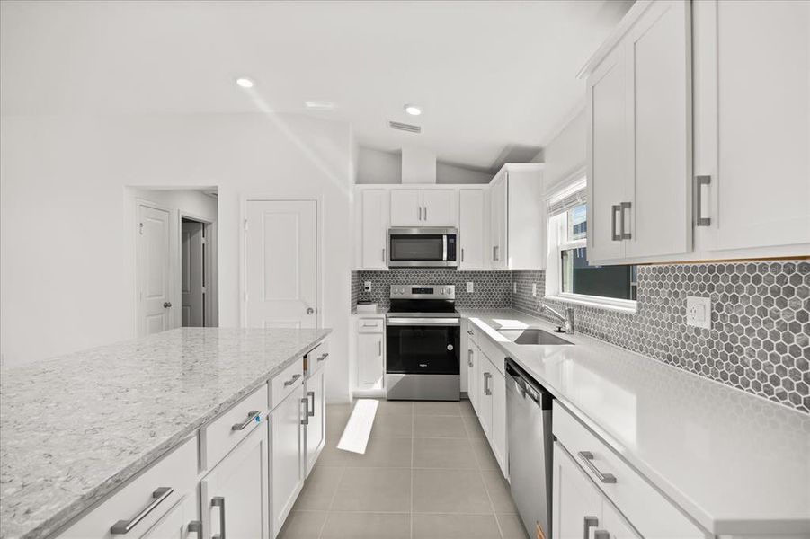 Furnished interior view inside a new home in Hickory Ranch, Auburndale (Image 7).