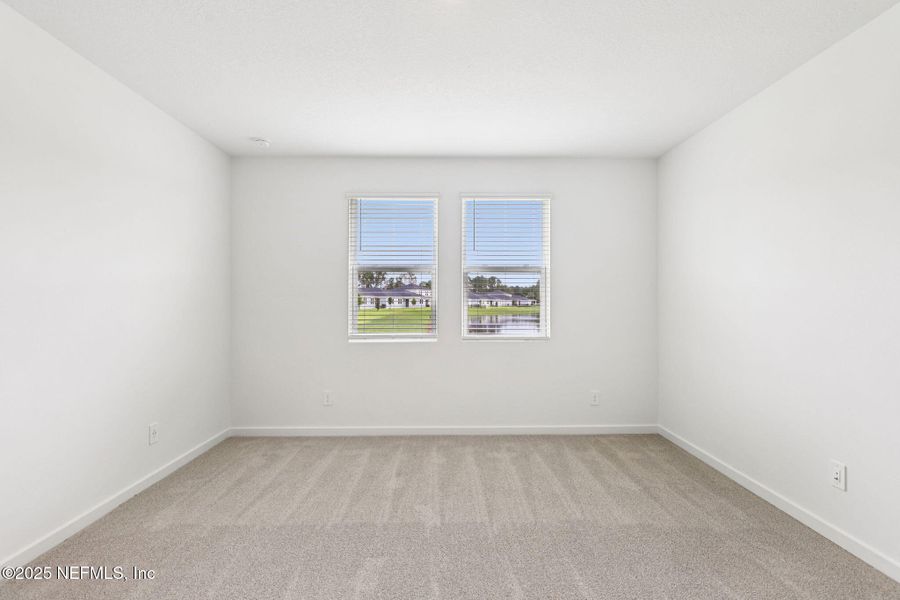 Spacious, unfurnished interior of a new home in Lakes at Bella Lago - Signature Series, Green Cove Springs (Image 14).