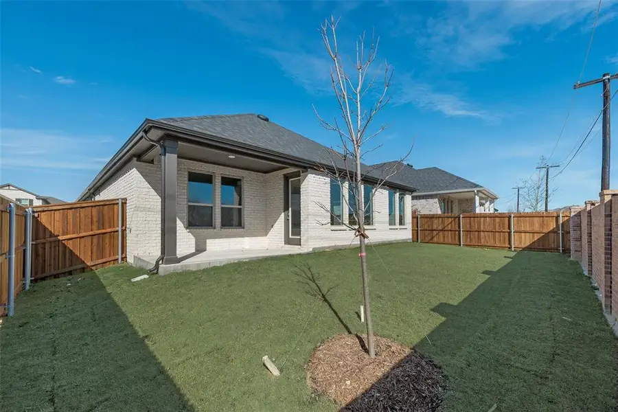 Exterior details and patio area of a home in Villages of Hurricane Creek, Anna (Image 3). Exterior details and patio area of a home in Villages of Hurricane Creek, Anna (Image 3).