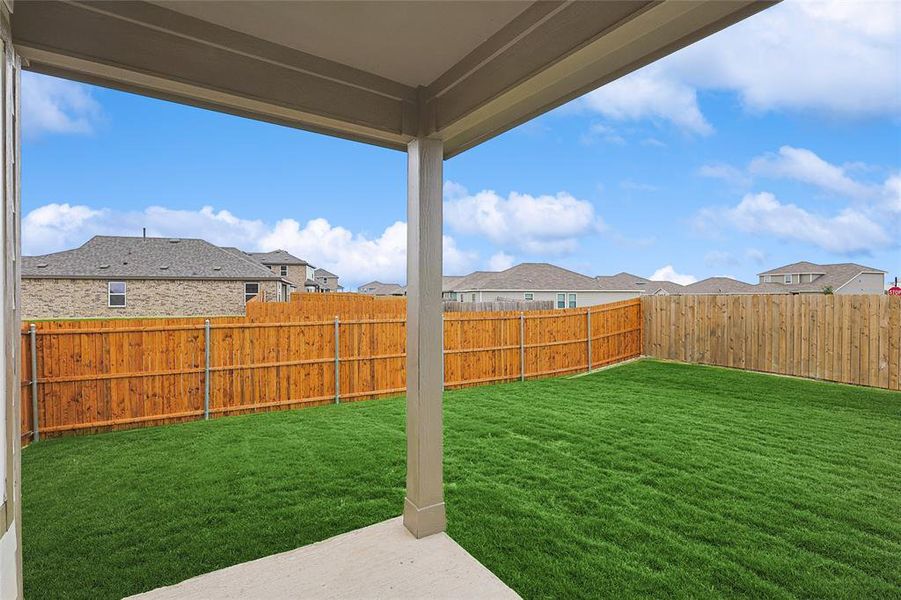 View of yard with a patio